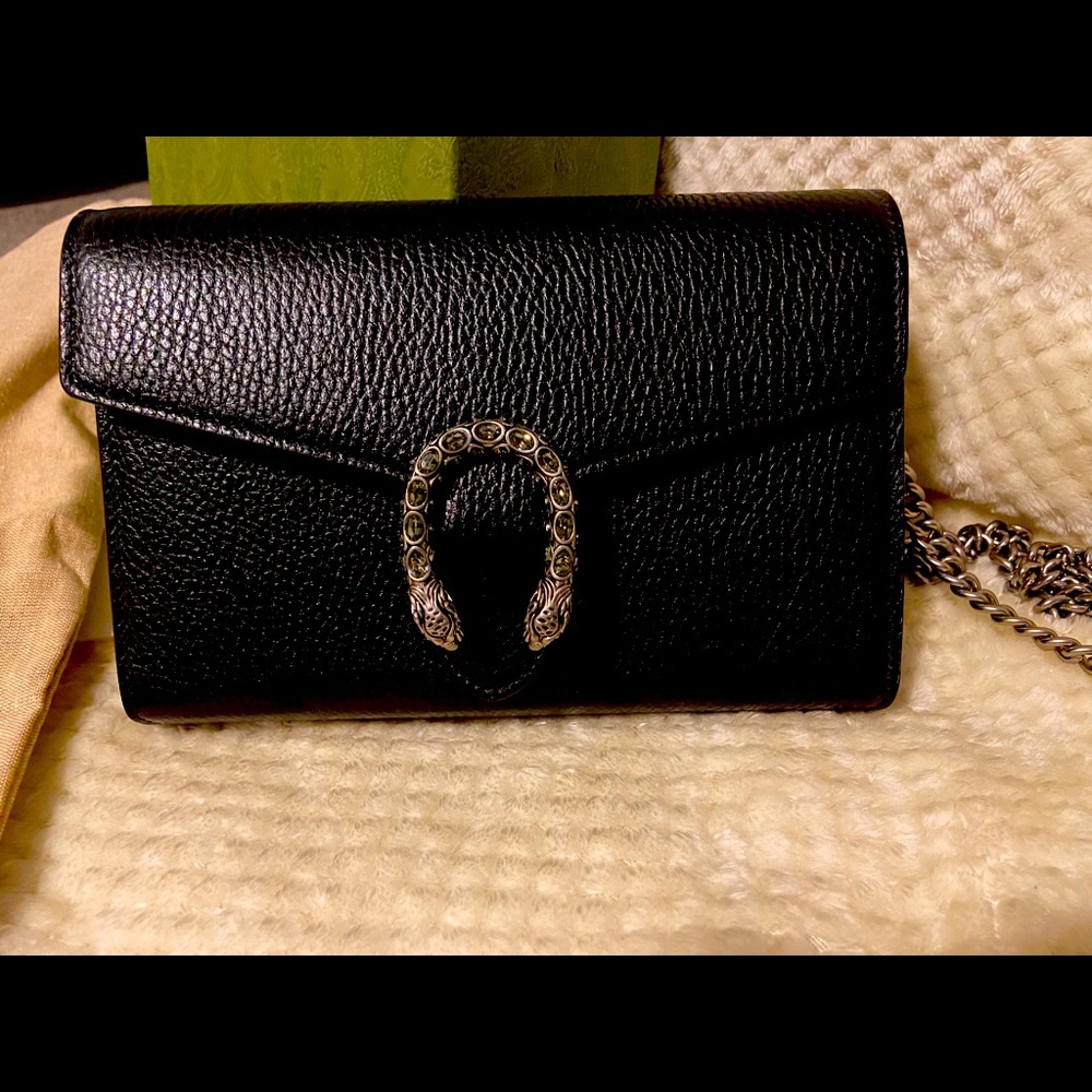 New never used Gucci Clutch